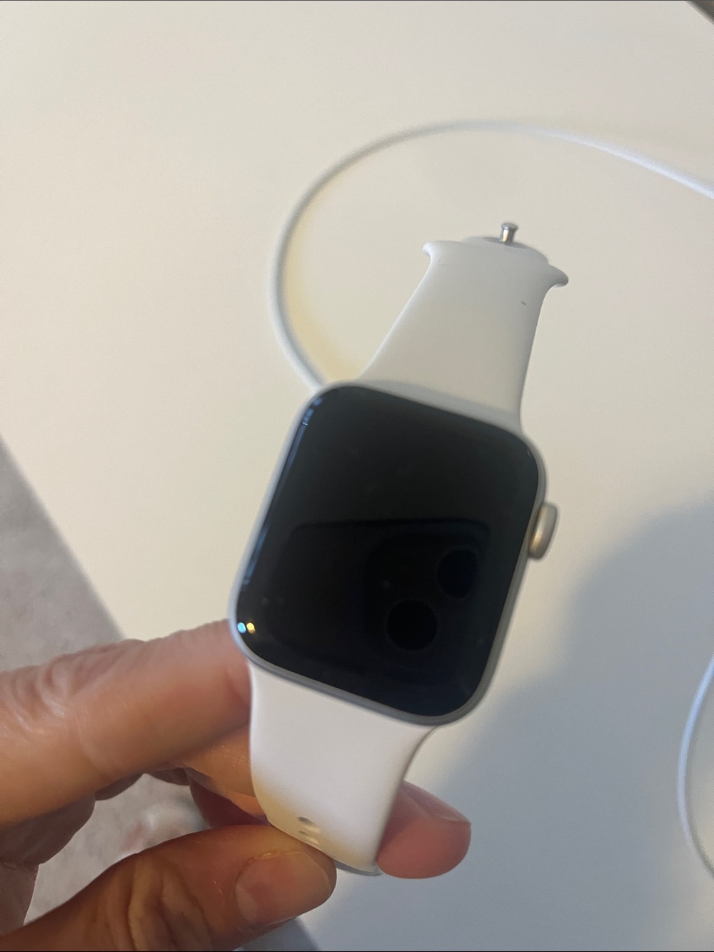 White Apple Watch SE 4.0 MM with White Silicone Band - Picture 3 of 3